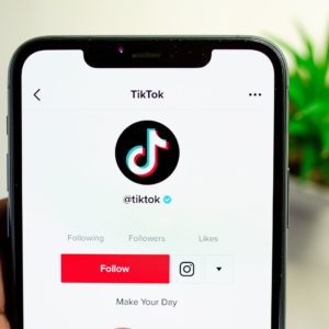 a smartphone with the tiktok app opened