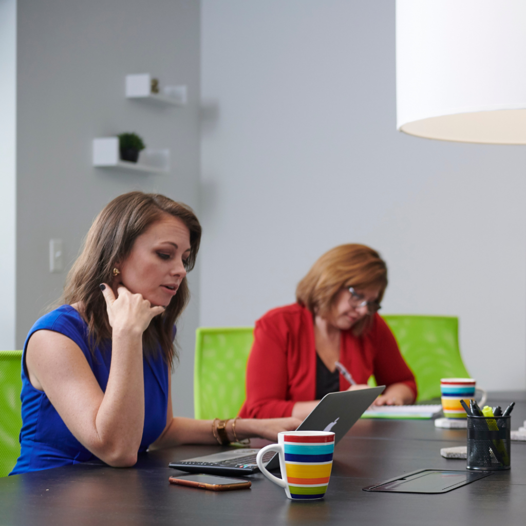 two women meet to discuss a marketing funnel strategy