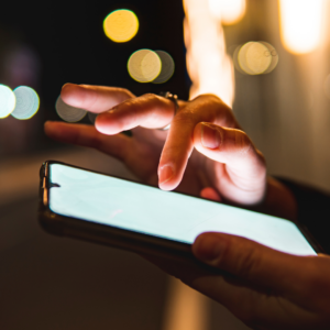 a person using a smartphone to look at the Threads app