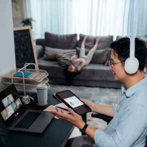 a man works on his computer at home