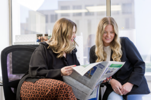 karlie and sydni read client media stories in the tulsa world